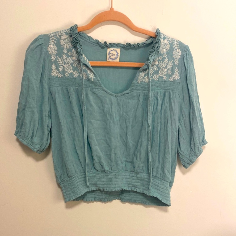 Turquoise quarter length sleeve top with embroidered top, Francescas, size small